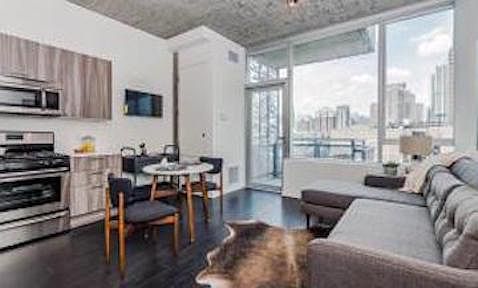 Living room with balcony right off the main room