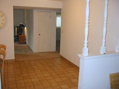 dining room opens to living room and family room