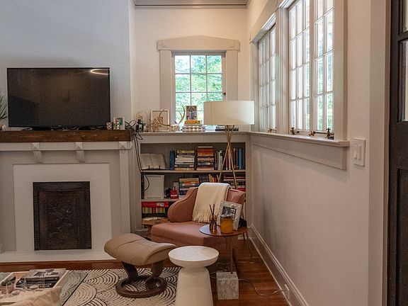 Built in storage inside living room, recessed lighting and contemporary fixture.
(furnishings not included)