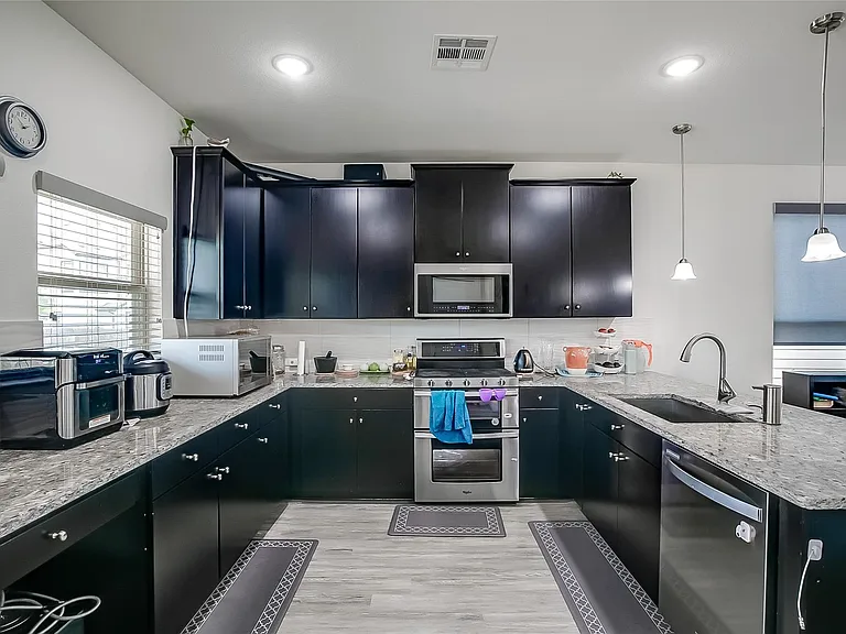15912 Cadoz Dr — Photo 11