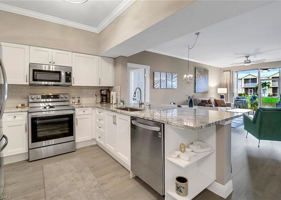 1st image of 20261 Estero Gardens CIR #104
