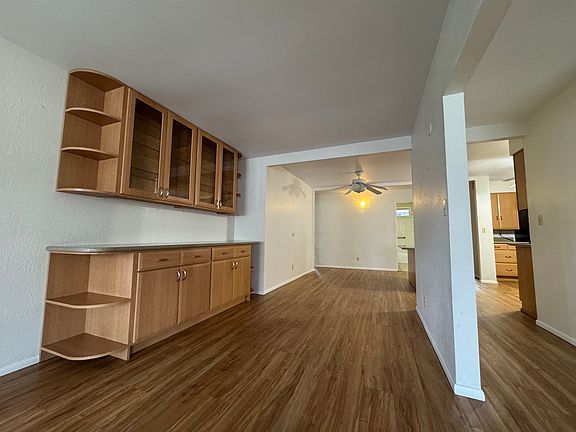 Multiple built in cabinets and storage spaces.