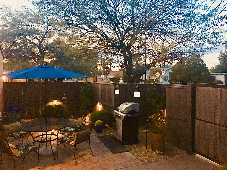 Sadly the tree in photo fell down in a micro burst. New tree has been planted. Beautiful sunsets can be observed from the patio.