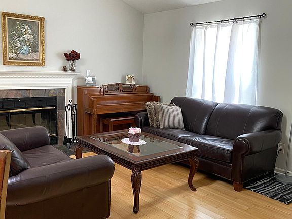 real leather sofas and piano