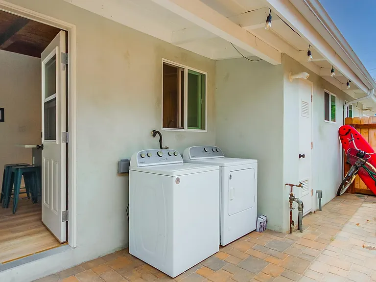 Washer and dryer included! No sharing with other units. Also has an outdoor storage closet for beach gear and other storage.
