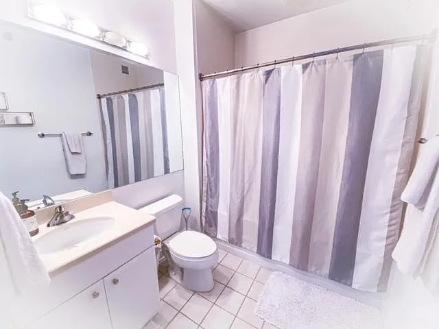 Bathroom with tub and shower