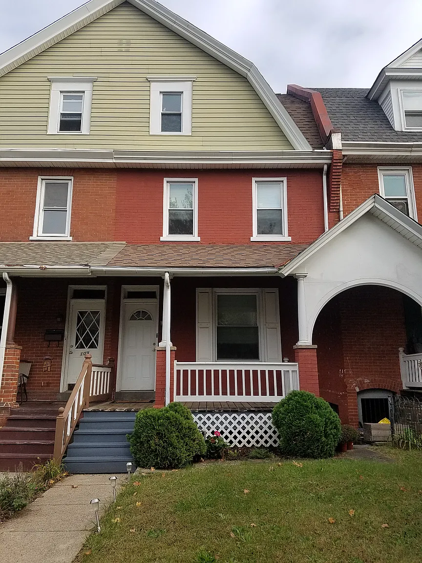 111 E 3rd St photo 1