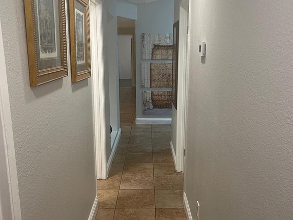 hallway to all 3 bedrooms