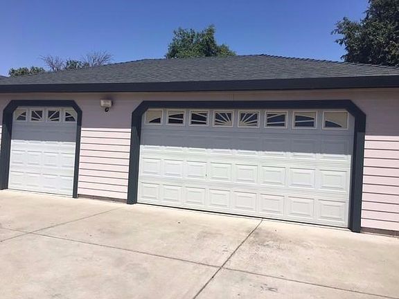 3 Car Garage with 10 foot ceilings and 8 foot garage doors