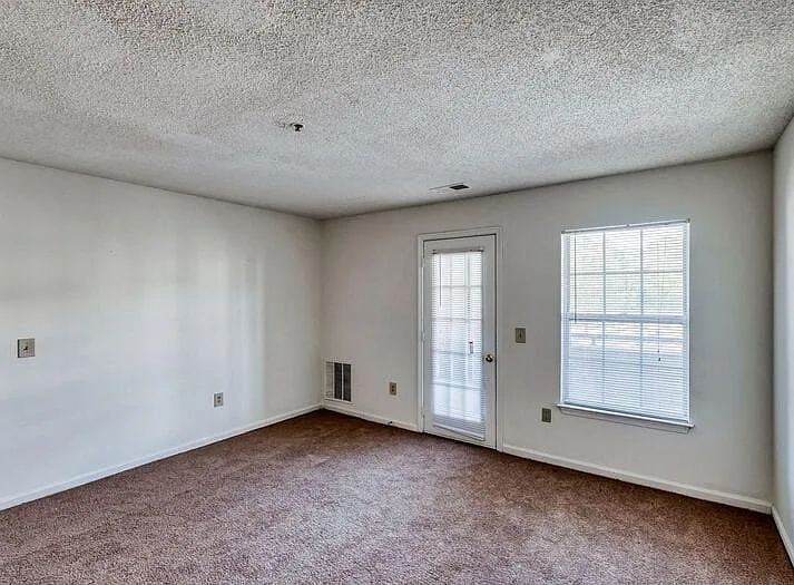 Living area with private patio/balcony access
