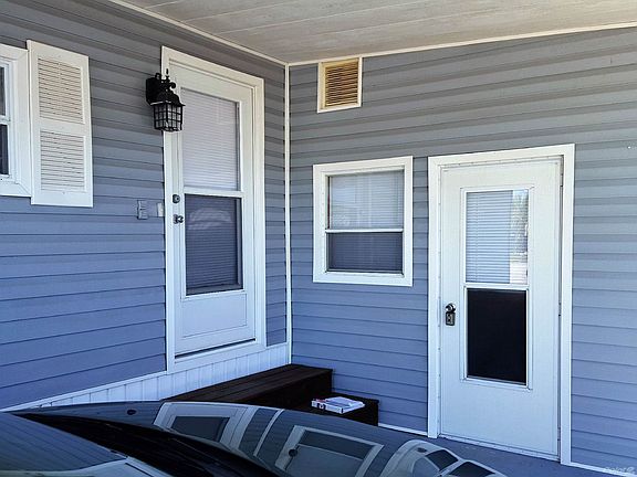 Carport entrance and utility room
