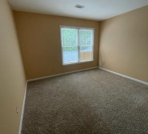 Bedroom 3- upper level. Bedrooms 2 and 3 share a bathroom in the hallway.