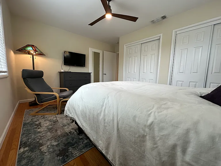 Master bedroom dresser, lamp, chair