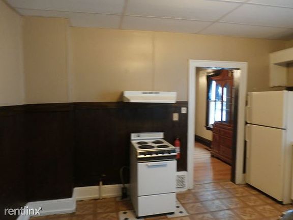 Kitchen - Refrigerator and Range Included