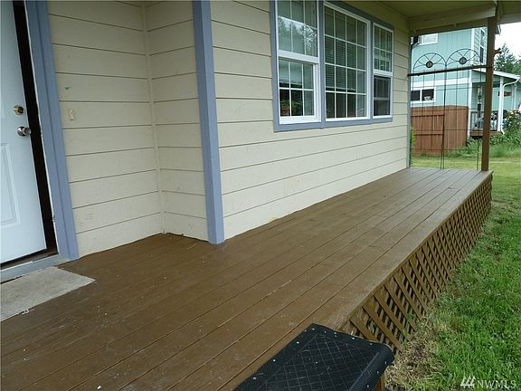 Just imagine some rocking chairs on your front porch!