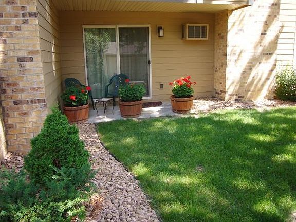 Secluded, private South facing patio and just around the corner from swimming pool.