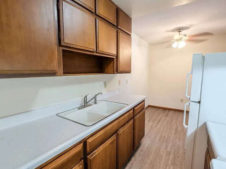 Welcome to Central Lakes of Uptown, where modern convenience meets warm design. This spacious kitchen features ample cabinetry and a sleek layout, perfect for culinary enthusiasts. Make it yours today and elevate your lifestyle! Inquire now!