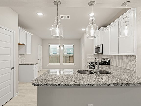 Penisula with pendant lighting