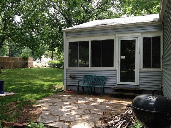 Rear patio and sunroom