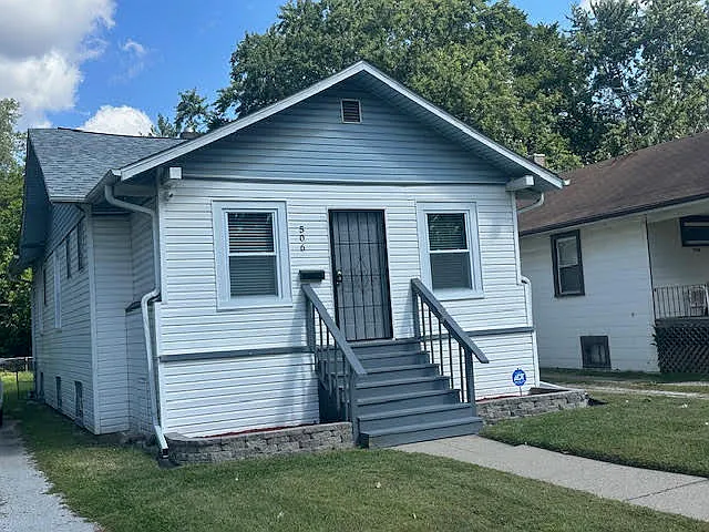 506 E 144th Pl photo 1