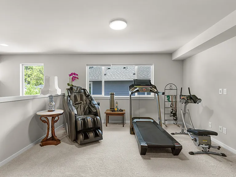 Home gym, complete with high end massage chair