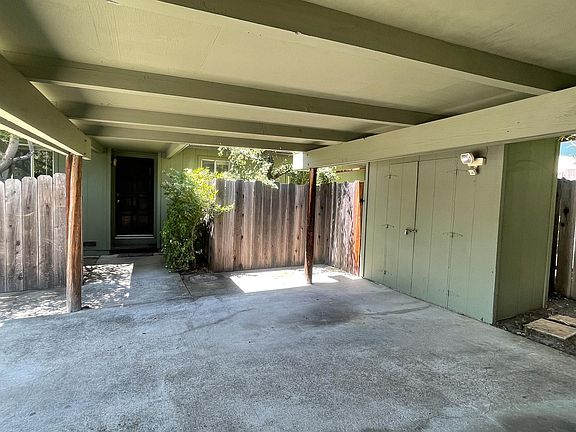 Outside storage, front entrance, carport, patio on both sides