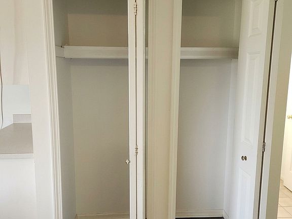 Hall closet between kitchen and laundry room