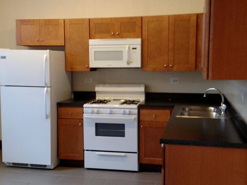 Kitchen *Shown here with white appliances but they have been changed to stainless appliances.