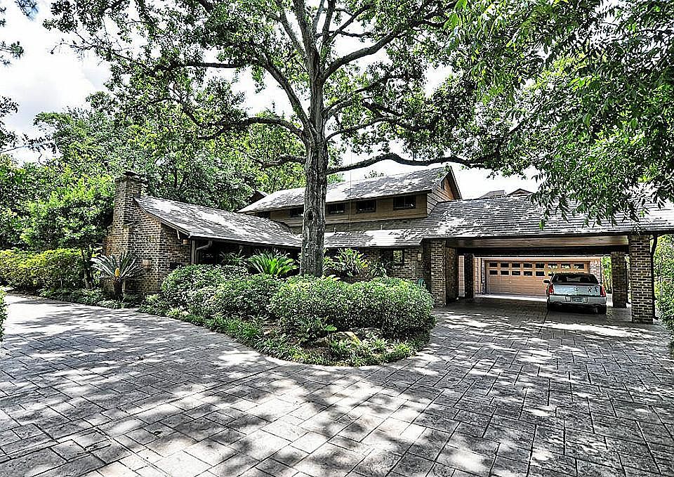 This grand estate sits on a 100x401 landscaped lot. Stamped concrete circular drive, walkways and po