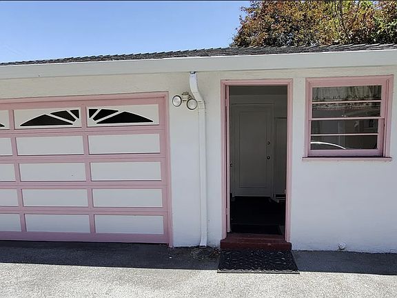 Private garage for 1 car with storage and Laundry room on premises.