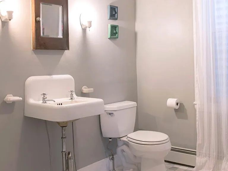 Large bathroom with marble tile
