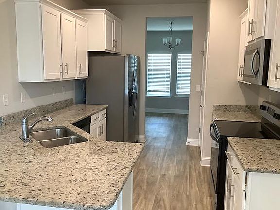Kitchen looking into dining room.