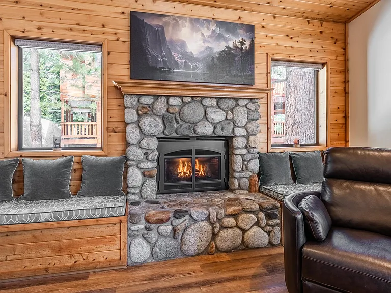 Cozy up to this fireplace after a long day of skiing