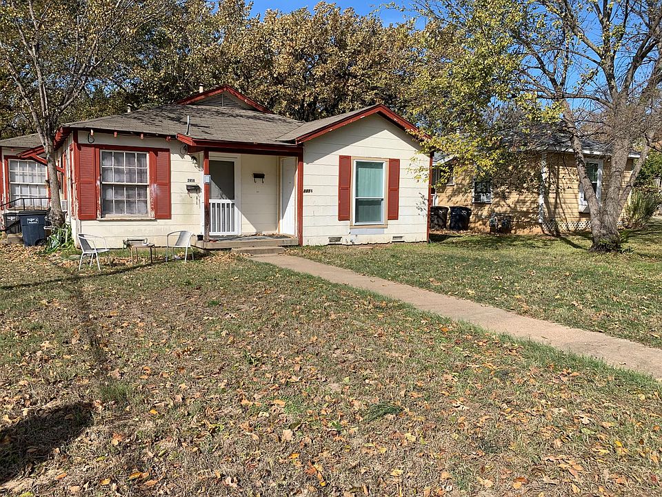 Duplex - unit for rent is on the right - 2856 the not so visible front door on right side of porch (the other side 2858 is rented)