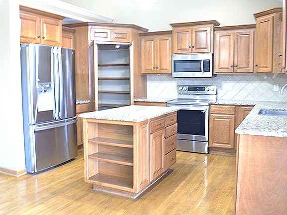Spacious and bright Kitchen. Microwave, Refrigerator with Freezer, Dishwasher included. Walk in pantry.