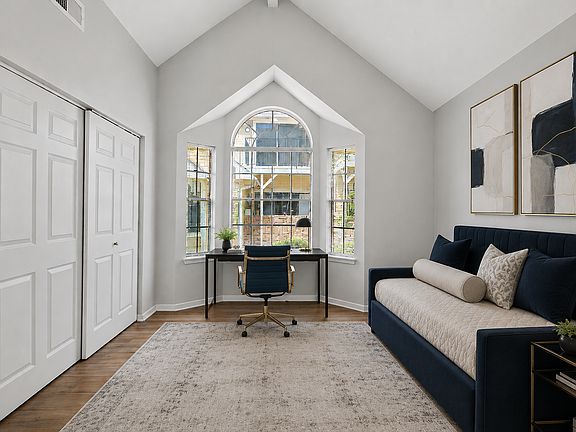 Bright secondary bedroom with architectural charm