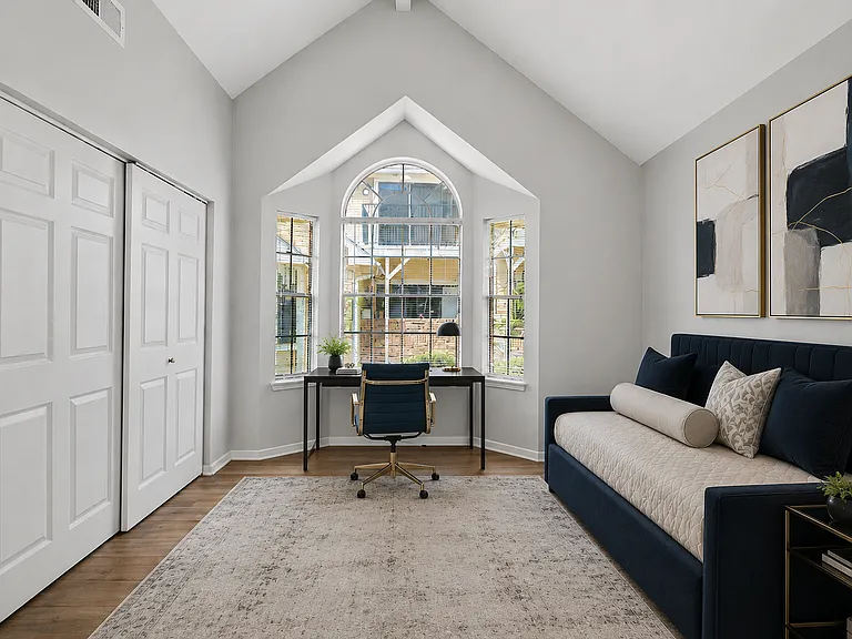 Bright secondary bedroom with architectural charm