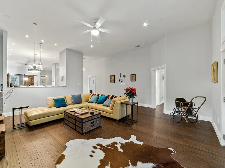 Large living room opens to the kitchen for optimal entertaining.