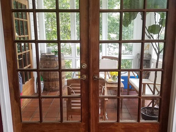 Door to Sunroom taken from screen proch