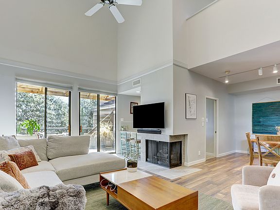 The living room and kitchen have an open feel