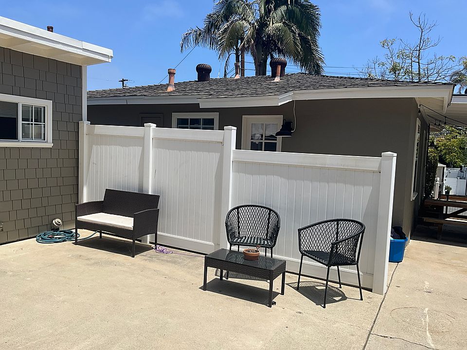 Privacy fence between back and front cottages.