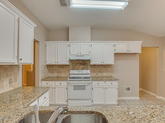 3rd image of 8719 Townsquare Dr N