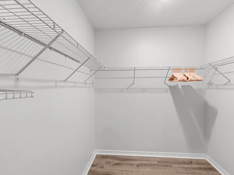 walk in closet #1 - primary bedroom