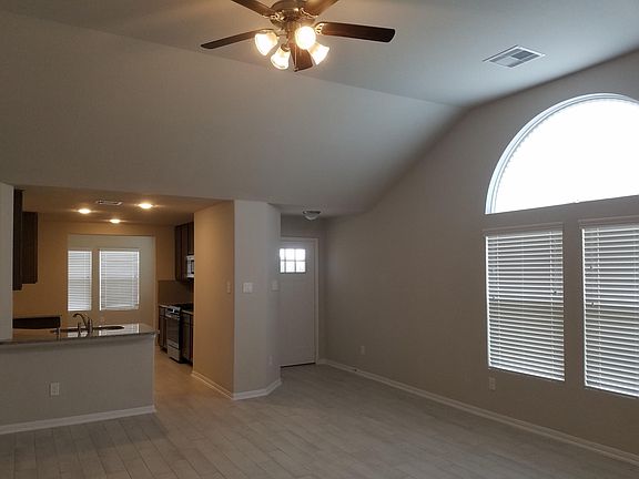 Family Room and Front Entry looking into Kitchen
