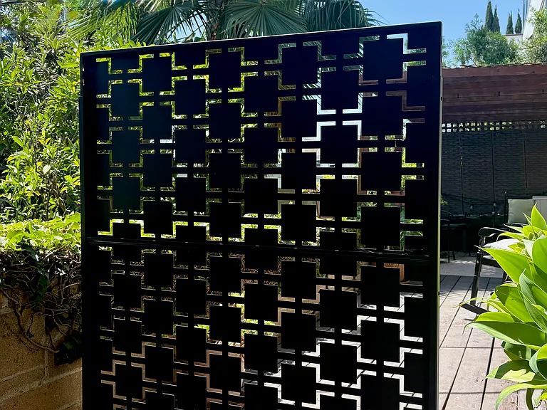 Privacy screen creates a more secluded outdoor retreat.