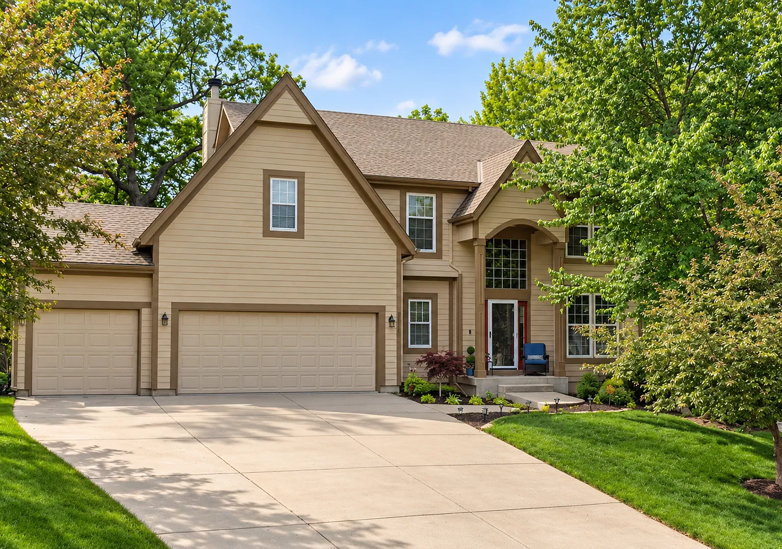 Beautiful 5 Bedroom 4.5 Bathroom Olathe Home with Finished Basement, 3-Car Garage & Flexible Furn... — Photo 1