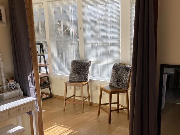 This picture shows a view of the heated porch from the one room.