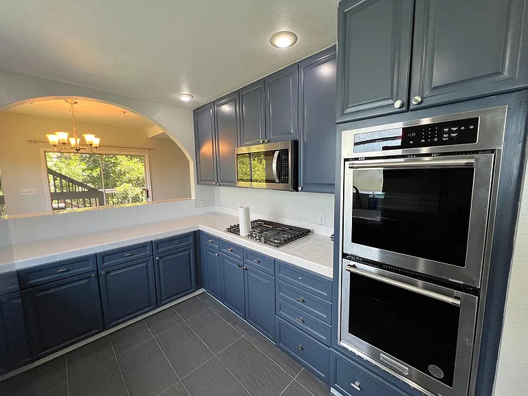 Brand new gas stovetop, double oven, and built in microwave/hood