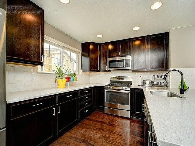 Gourmet's Kitchen with white quartz counters
