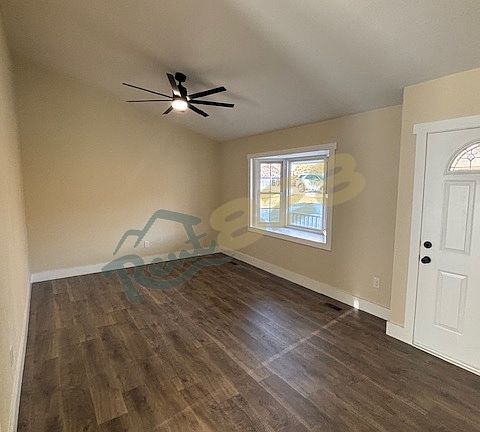 living room with vaulted ceiling
